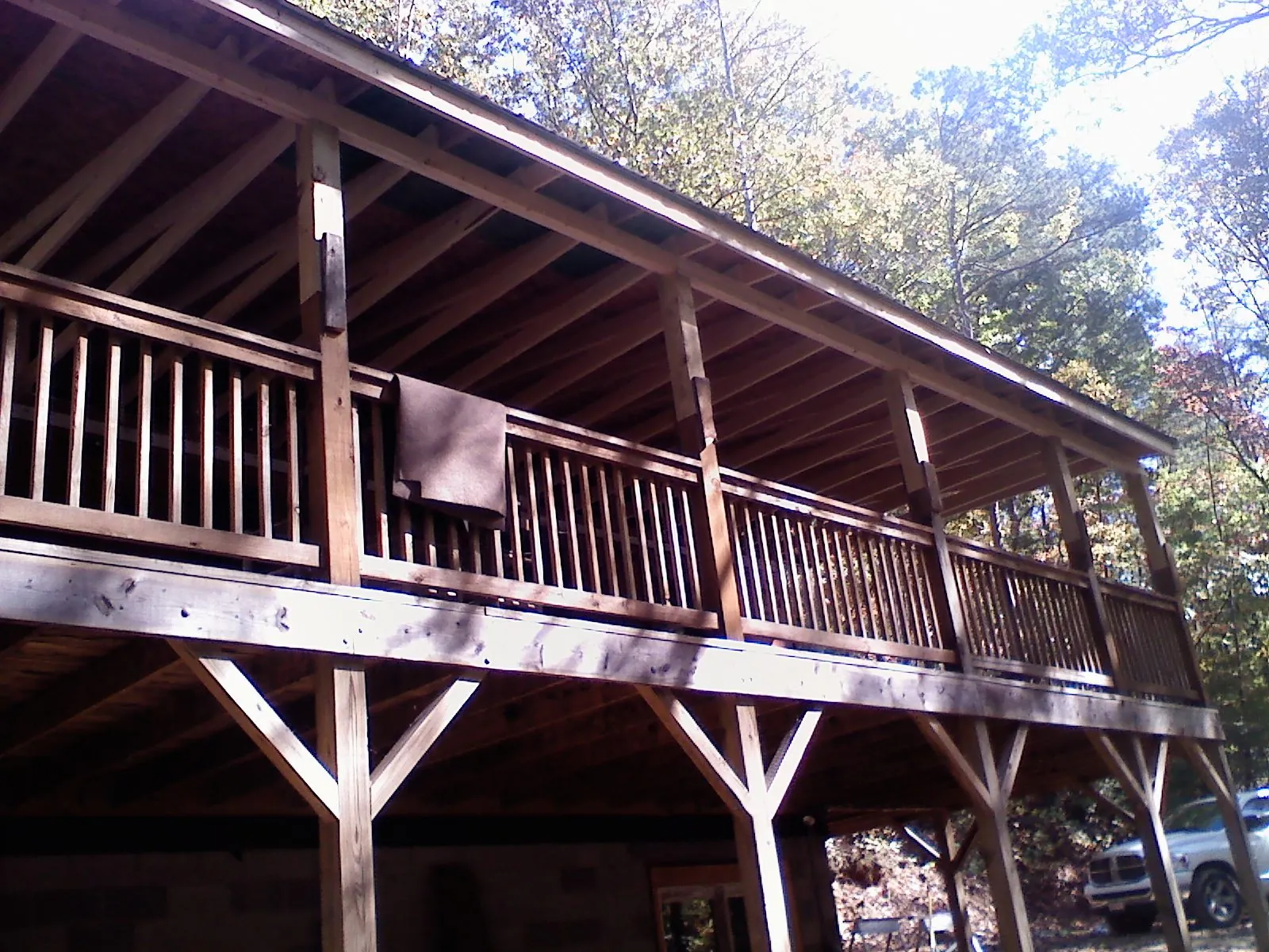 Timber framing under a new elevated porch and deck — Roof Leak Repair in Mountain View by Roofing Brothers